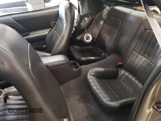 2001 Chevrolet Camaro Z28 z VIN 2G1FP22GX12112874, wystawiony jako Copart lot #70669594 z przebiegiem 58 773 mil mil oraz Szkoda całkowita • Salvage title. Historia ofert i sprzedaży dostępna na DreamBid. Obrazek 10.
