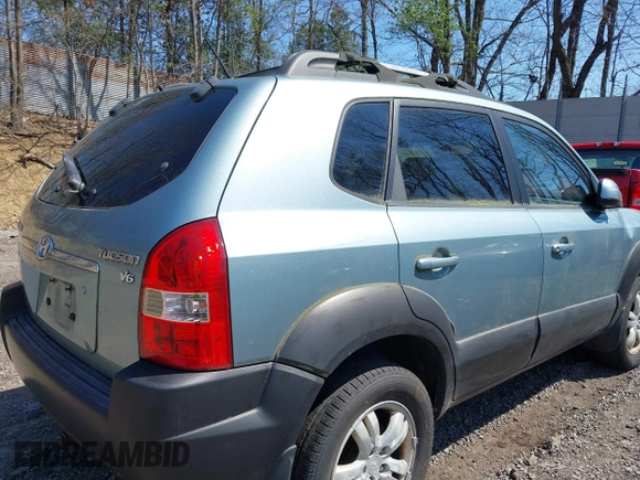 2006 Hyundai Tucson GLS with VIN KM8JN12D06U285856, listed as a IAAI auction lot 42112640 with 157,016 mi miles. Bid and sale history available at carsss.com. Image 16.