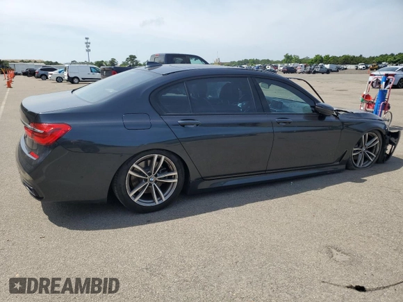 2019 BMW 7 Series 740i xDrive z VIN WBA7E4C56KGV71028, wystawiony jako Copart lot #76860474 z przebiegiem 66 657 mil mil oraz Nie do naprawy • Non repairable. Historia ofert i sprzedaży dostępna na DreamBid. Obrazek 3.