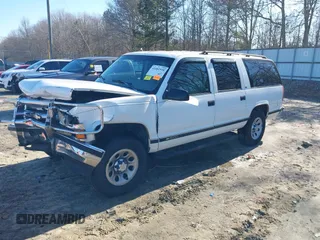 1996 Chevrolet Suburban with VIN 3GNFK16RXTG135350, listed as a IAAI auction lot 41482918 with 157,971 mi miles. Bid and sale history available at carsss.com. Image 2.