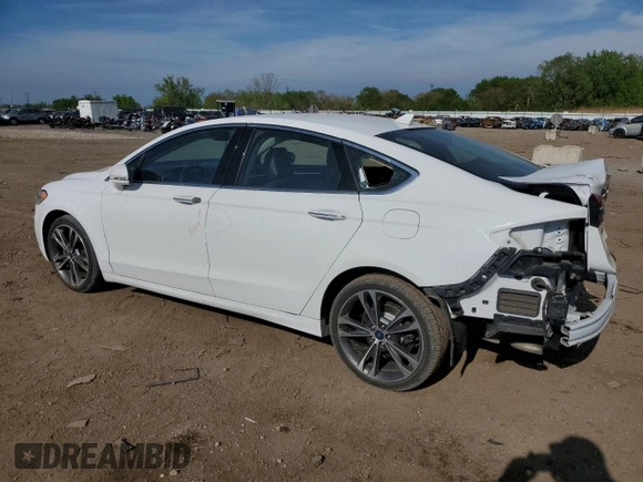 2020 Ford Fusion Titanium with VIN 3FA6P0D96LR173756, listed as a Copart auction lot 56467885 with 77,217 mi miles and Salvage title. Bid and sale history available at DreamBid. Image 2.