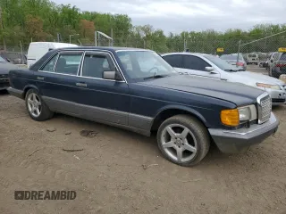 1988 Mercedes-Benz 560 with VIN WDBCA39D5JA386880, listed as a Copart auction lot 53676005 with 206,155 mi miles and Salvage Title. Bid and sale history available at DreamBid. Image 4.