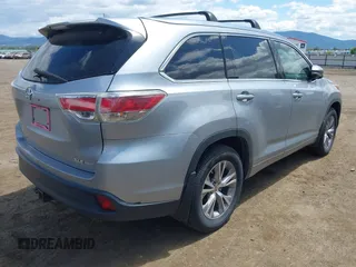 2015 Toyota Highlander XLE z VIN 5TDJKRFH9FS099780, wystawiony jako IAAI lot #42407689 z przebiegiem 159 406 mil mil oraz . Historia ofert i sprzedaży dostępna na DreamBid. Obrazek 4.