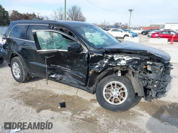 2018 Jeep Grand Cherokee Laredo E with VIN 1C4RJFAG7JC244103, listed as a IAAI auction lot 41260642 with 116,797 mi miles. Bid and sale history available at carsss.com. Image 1.