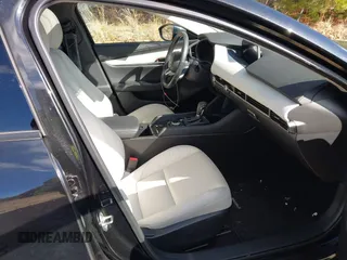 2023 Mazda 3 Premium Plus with VIN 3MZBPBEY9PM385318, listed as a IAAI auction lot 41882334 with 10,582 mi miles and . Bid and sale history available at DreamBid. Image 5.