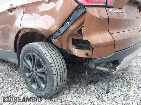 2017 Ford Escape SE with VIN 1FMCU9G96HUC12475, listed as a IAAI auction lot 41741342 with 102,823 mi miles. Bid and sale history available at carsss.com. Image 20.