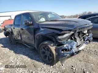 2023 Ram 1500 Limited with VIN 1C6SRFHT5PN666744, listed as a Copart auction lot 48538235 with 54,446 mi miles and Salvage title. Bid and sale history available at DreamBid. Image 4.