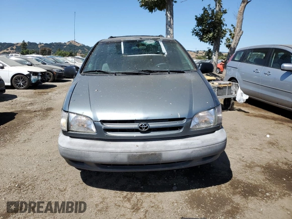 2000 Toyota Sienna LE with VIN 4T3ZF13C6YU296375, listed as a Copart auction lot 63846875 with 279,915 mi miles and Salvage title. Bid and sale history available at DreamBid. Image 5.