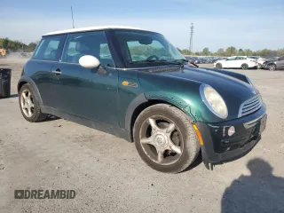 2004 MINI Hardtop with VIN WMWRC334X4TJ61391, listed as a Copart auction lot 53735615 with 103,974 mi miles and Salvage Title. Bid and sale history available at DreamBid. Image 4.