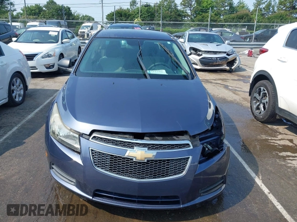 2014 Chevrolet Cruze LS z VIN 1G1PA5SG1E7203604, wystawiony jako IAAI lot #42381528 z przebiegiem 83 079 mil mil oraz . Historia ofert i sprzedaży dostępna na DreamBid. Obrazek 13.