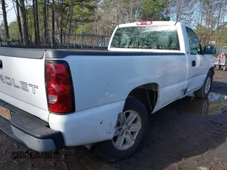 2004 Chevrolet Silverado 1500 Work Truck with VIN 1GCEC14X14Z201305, listed as a IAAI auction lot 41619446 with 166,615 mi miles. Bid and sale history available at carsss.com. Image 6.