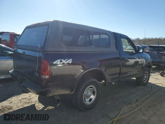2002 Ford F-150 XL with VIN 1FTRF18232NA58109, listed as a Copart auction lot 79080674 with 148,213 mi miles and Salvage title. Bid and sale history available at DreamBid. Image 3.