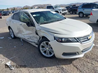 2014 Chevrolet Impala LT z VIN 1G1115SL6EU124255, wystawiony jako IAAI lot #40976596 z przebiegiem 36 207 mil mil oraz . Historia ofert i sprzedaży dostępna na DreamBid. Obrazek 1.