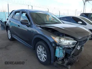 2014 Mazda CX-5 Touring with VIN JM3KE2CY9E0384401, listed as a IAAI auction lot 41699913 with 75,301 mi miles. Bid and sale history available at carsss.com. Image 1.