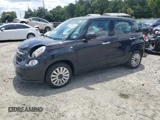 2014 FIAT 500L Easy with VIN ZFBCFABH5EZ011733, listed as a Copart auction lot 60415465 with 113,080 mi miles and Salvage title. Bid and sale history available at DreamBid. Image 1.