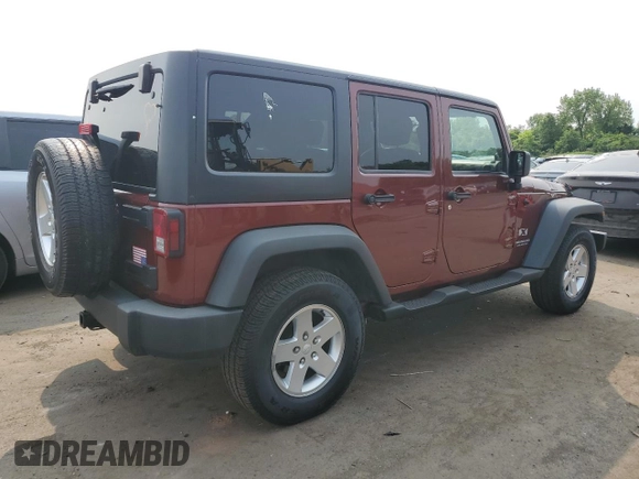 2007 Jeep Wrangler Unlimited X z VIN 1J4GA391X7L169728, wystawiony jako Copart lot #59484265 z przebiegiem 165 674 mil mil oraz Szkoda całkowita • Salvage title. Historia ofert i sprzedaży dostępna na DreamBid. Obrazek 3.
