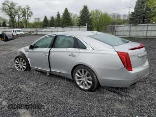 2016 Cadillac XTS Luxury Collection z VIN 2G61N5S31G9194437, wystawiony jako Copart lot #56017485 z przebiegiem 75 979 mil mil oraz Szkody całkowita. Historia ofert i sprzedaży dostępna na DreamBid. Obrazek 2.