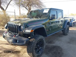 2021 Jeep Gladiator Mojave with VIN 1C6JJTEG8ML606876, listed as a IAAI auction lot 41632052 with 30,255 mi miles and . Bid and sale history available at DreamBid. Image 2.