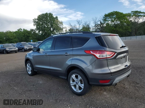 2014 Ford Escape SE z VIN 1FMCU9GX3EUE26446, wystawiony jako Copart lot #57113865 z przebiegiem 145 699 mil mil oraz Szkoda całkowita • Salvage title. Historia ofert i sprzedaży dostępna na DreamBid. Obrazek 2.