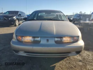 1999 Saturn SL with VIN 1G8ZK5270XZ147170, listed as a Copart auction lot 42169385 with 141,100 mi miles and Clean title. Bid and sale history available at DreamBid. Image 5.