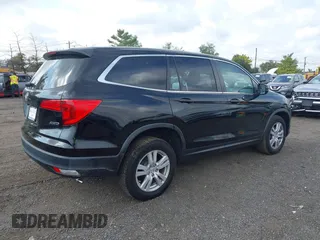 2016 Honda Pilot LX with VIN 5FNYF6H16GB095208, listed as a IAAI auction lot 40512118 with 150,280 mi miles. Bid and sale history available at carsss.com. Image 4.