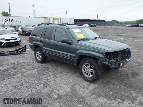 2004 Jeep Grand Cherokee Laredo with VIN 1J4GW48S24C276284, listed as a IAAI auction lot 42596655 with 142,524 mi miles and . Bid and sale history available at DreamBid. Image 1.