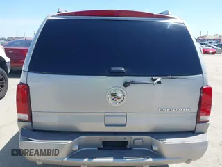 2005 Cadillac Escalade z VIN 1GYEC63N65R249827, wystawiony jako IAAI lot #42247650 z przebiegiem 254 052 mil mil oraz . Historia ofert i sprzedaży dostępna na DreamBid. Obrazek 17.