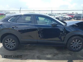 2021 Mazda CX-30 S with VIN 3MVDMBAL0MM254030, listed as a IAAI auction lot 42261180 with 72,459 mi miles and . Bid and sale history available at DreamBid. Image 13.
