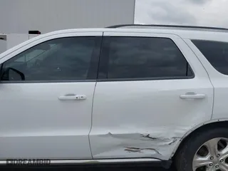 2014 Dodge Durango Limited with VIN 1C4RDHDG2EC318144, listed as a IAAI auction lot 41712791 with 124,569 mi miles. Bid and sale history available at carsss.com. Image 14.