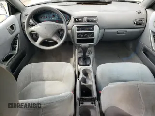 2002 Mitsubishi Galant ES z VIN 4A3AA46G12E124150, wystawiony jako Copart lot #60691994 z przebiegiem 113 597 mil mil oraz Szkoda całkowita • Salvage title. Historia ofert i sprzedaży dostępna na DreamBid. Obrazek 8.