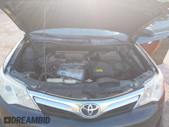 2014 Toyota Camry L with VIN 4T4BF1FK7ER349244, listed as a IAAI auction lot 42040599 with 186,545 mi miles. Bid and sale history available at carsss.com. Image 10.