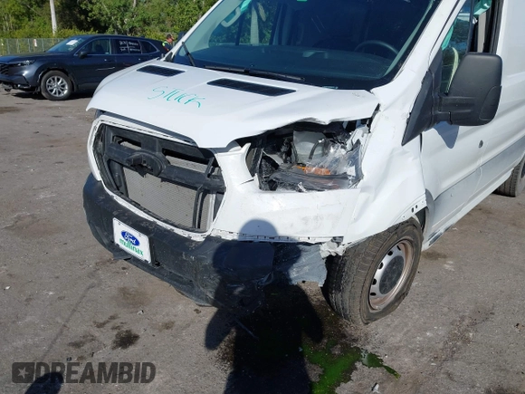 2023 Ford Transit Cargo with VIN 1FTBR1Y81PKB93787, listed as a IAAI auction lot 41253973 with 16,058 mi miles and . Bid and sale history available at DreamBid. Image 6.