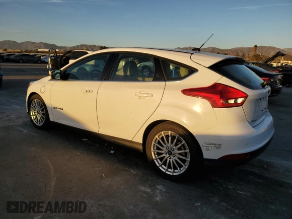 2016 Ford Focus Electric z VIN 1FADP3R43GL238458, wystawiony jako Copart lot #84111784 z przebiegiem 116 907 mil mil oraz Szkody całkowita. Historia ofert i sprzedaży dostępna na DreamBid. Obrazek 2.