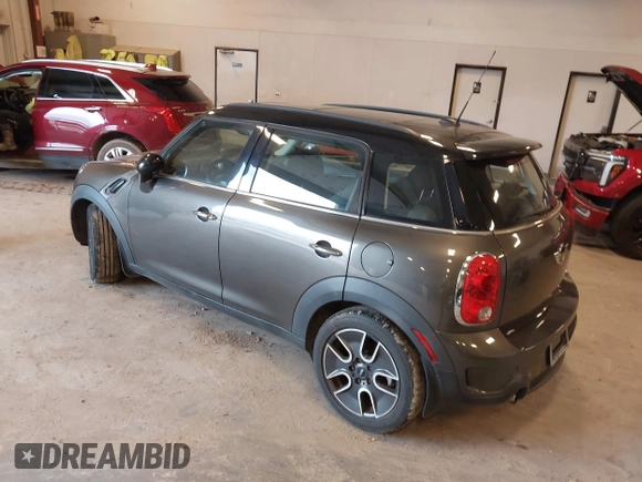 2011 MINI Countryman S z VIN WMWZC3C54BWL78942, wystawiony jako IAAI lot #42345296 z przebiegiem 158 202 mil mil oraz . Historia ofert i sprzedaży dostępna na DreamBid. Obrazek 3.