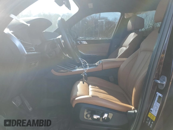 2022 BMW X7 xDrive40i z VIN 5UXCW2C00N9K81494, wystawiony jako Copart lot #51406425 z przebiegiem Nie podano mil oraz Szkoda całkowita • Salvage title. Historia ofert i sprzedaży dostępna na DreamBid. Obrazek 7.