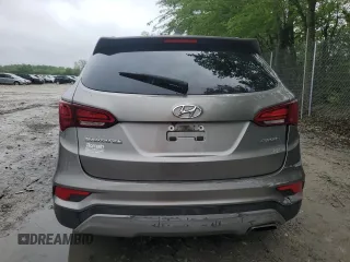 2017 Hyundai Santa Fe 2.4L z VIN 5NMZU3LB8HH032409, wystawiony jako Copart lot #57939915 z przebiegiem 105 494 mil mil oraz Szkoda całkowita • Salvage title. Historia ofert i sprzedaży dostępna na DreamBid. Obrazek 6.