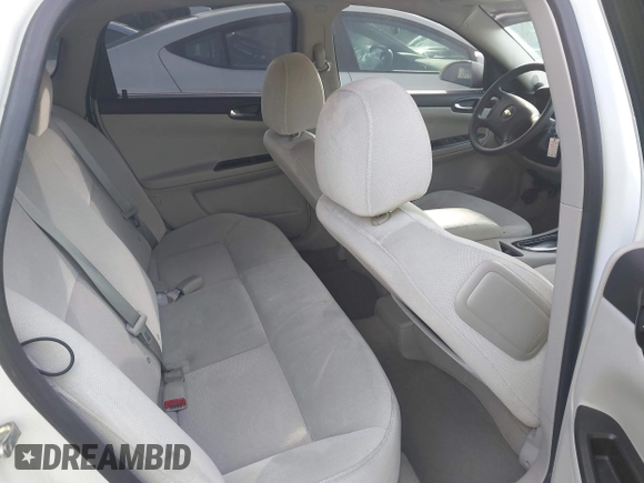 2014 Chevrolet Impala LS with VIN 2G1WA5E34E1176321, listed as a IAAI auction lot 42447074 with 91,173 mi miles and . Bid and sale history available at DreamBid. Image 8.