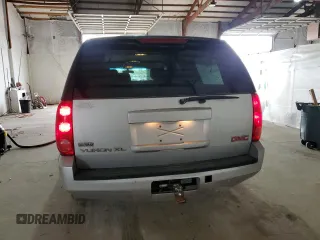 2010 GMC Yukon XL z VIN 1GKUKHE34AR126165, wystawiony jako Copart lot #52317135 z przebiegiem 234 675 mil mil oraz Tytuł czysty. Historia ofert i sprzedaży dostępna na DreamBid. Obrazek 6.