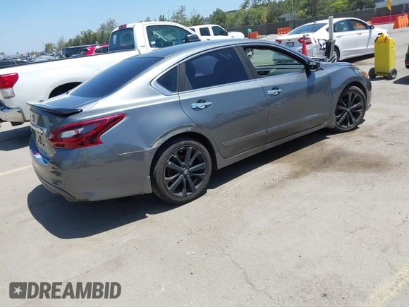 2017 Nissan Altima S z VIN 1N4AL3AP9HC236901, wystawiony jako IAAI lot #42275150 z przebiegiem 136 230 mil mil oraz . Historia ofert i sprzedaży dostępna na DreamBid. Obrazek 4.