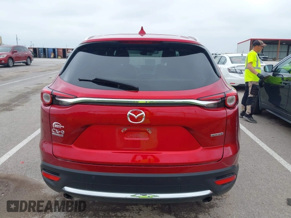 2021 Mazda CX-9 Signature with VIN JM3TCBEY9M0511928, listed as a IAAI auction lot 42231925 with 26,367 mi miles and . Bid and sale history available at DreamBid. Image 16.