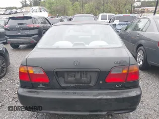 2000 Honda Civic LX with VIN 1HGEJ6674YL005143, listed as a IAAI auction lot 41961215 with 252,818 mi miles. Bid and sale history available at carsss.com. Image 16.