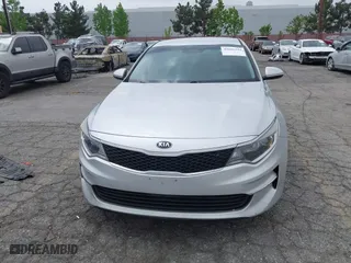 2016 Kia Optima LX with VIN KNAGT4L3XG5111796, listed as a IAAI auction lot 42106116 with 138,184 mi miles. Bid and sale history available at carsss.com. Image 12.
