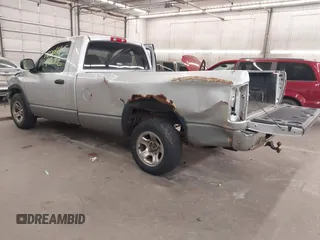 2002 Dodge 1500 z VIN 1D7HA16N52J256145, wystawiony jako IAAI lot #42206665 z przebiegiem 144 293 mil mil oraz . Historia ofert i sprzedaży dostępna na DreamBid. Obrazek 3.