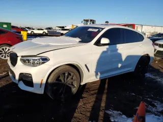 2021 BMW X4 M40i with VIN 5UX2V5C00M9E71264, listed as a Copart auction lot 41704355 with 51,970 mi miles and Salvage Title. Bid and sale history available at carsss.com. Image 1.