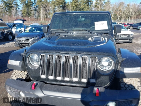 2023 Jeep Wrangler Rubicon with VIN 1C4JJXFGXPW682231, listed as a IAAI auction lot 41110264 with 15,147 mi miles and . Bid and sale history available at DreamBid. Image 12.