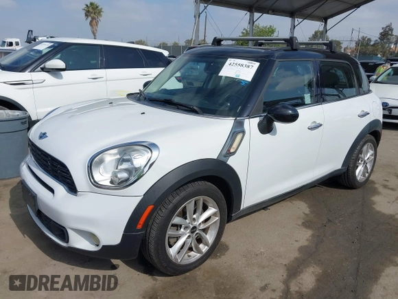 2013 MINI Countryman S with VIN WMWZC3C55DWP24628, listed as a IAAI auction lot 42558387 with 169,269 mi miles and . Bid and sale history available at DreamBid. Image 17.