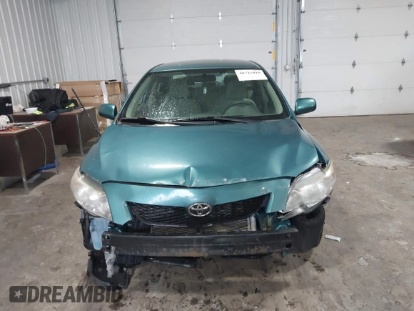2010 Toyota Corolla z VIN 2T1BU4EE2AC517770, wystawiony jako IAAI lot #40742010 z przebiegiem 152 224 mil mil oraz . Historia ofert i sprzedaży dostępna na DreamBid. Obrazek 12.