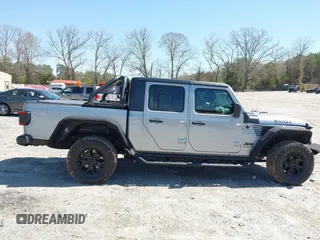 2021 Jeep Gladiator Freedom with VIN 1C6HJTAG3ML540967, listed as a IAAI auction lot 41883858 with 92,287 mi miles and . Bid and sale history available at DreamBid. Image 13.