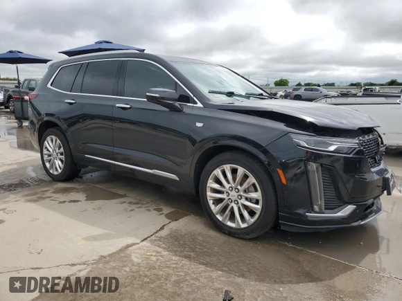 2020 Cadillac XT6 FWD Premium Luxury with VIN 1GYKPCRS9LZ148944, listed as a Copart auction lot 54406745 with 64,086 mi miles and Salvage title. Bid and sale history available at DreamBid. Image 4.