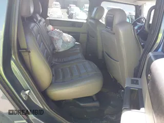 2005 Hummer H2 SUV with VIN 5GRGN23U35H105620, listed as a IAAI auction lot 41912574 with 232,938 mi miles. Bid and sale history available at carsss.com. Image 8.